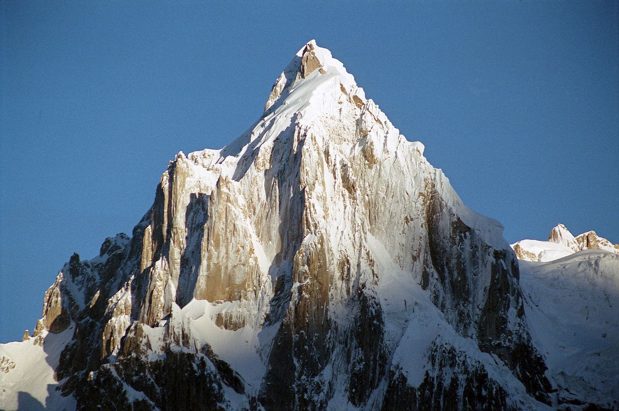 09 Paiju Peak From Khoburtse At Sunrise Paiju Peak is a beautiful mountain, seen here just after sunrise from Khoburtse. Paiju Peak (6610m) was first climbed by Bashir Ahmed, Nazir Sabir and Allen Steck on July 21, 1976.